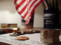 Coins on Paper with American Flag FREE Stock Photo, coins,  finance,  economy picture