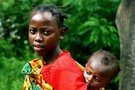 Young girl with infant on back in vibrant garment FREE Stock Photo, africa, mother, child picture